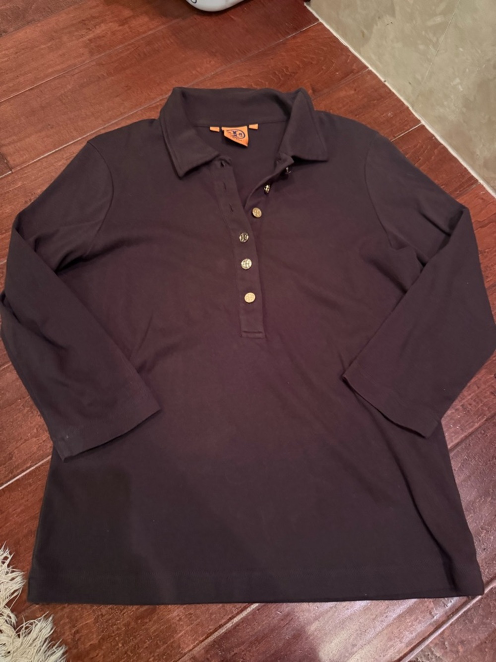 Tory Burch Long Polo Shirt, Women’s Size XL with gold buttons.